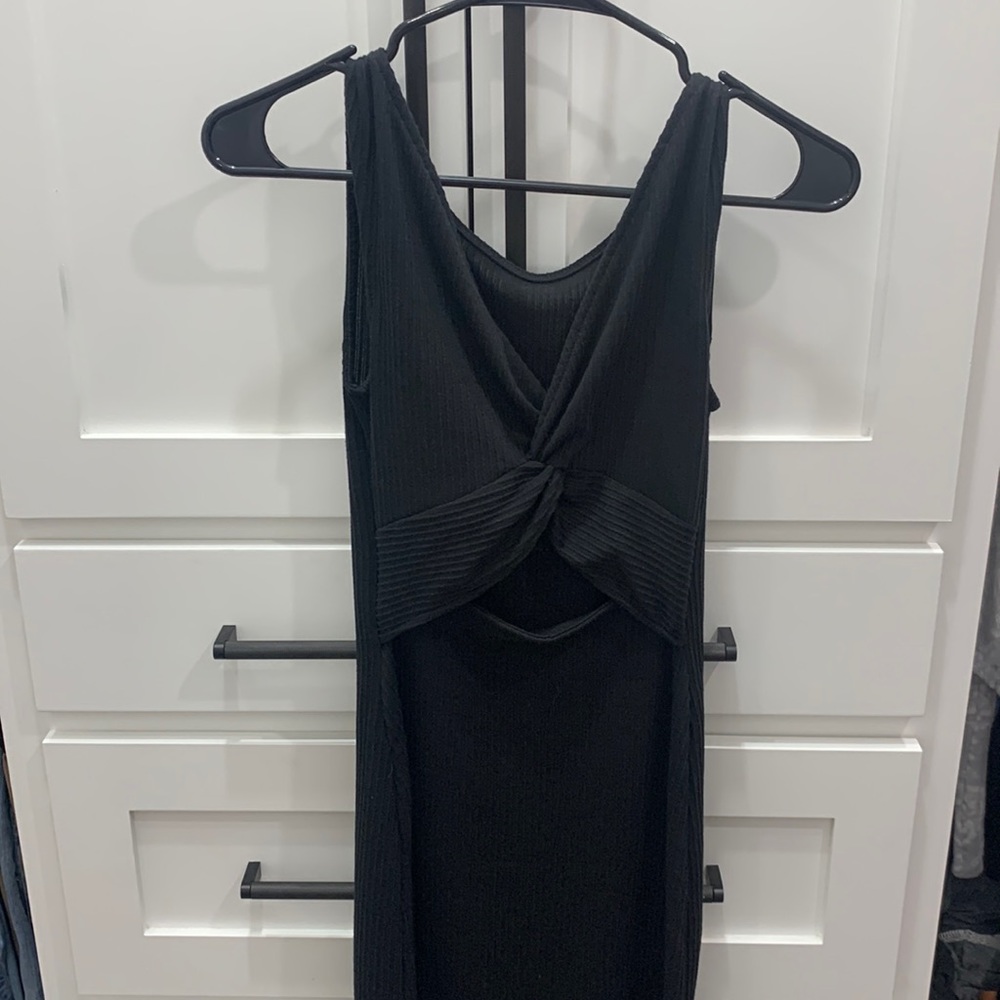 Super cute black midi with open cutout below bust.